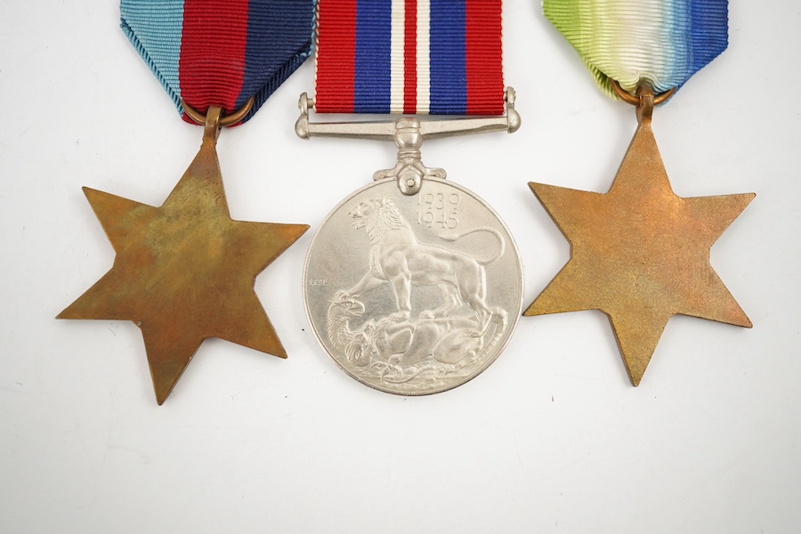 A First World War George V Bravery in the field medal awarded to CPL. R.E. Cox 11th Royal Sussex, a Second World War trio and miniatures, a Masonic medal, etc. (11). Condition - fair to good.